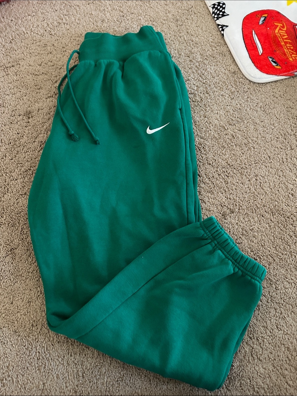 Nike Women’s Green Fleece Joggers with White Swoosh